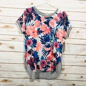 Rewind women’s floral short sleeve high low top L